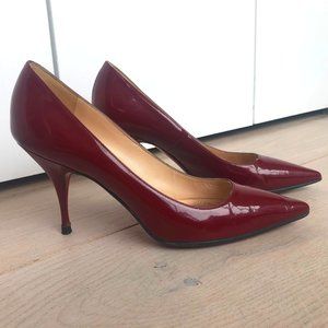 Christian Louboutin red patent leather pumps